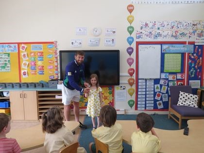 Mr Woolf handing out Mr A Tennis Award